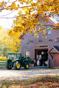 Tractor in front of Barrel House in the fall.